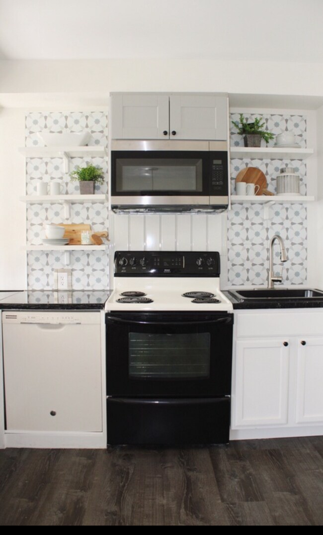 Building Photo - NO PETS. Don't miss this beautifully remol...