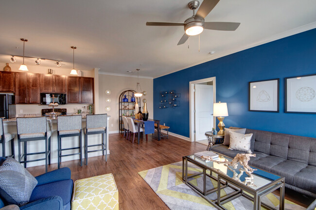 Living Room and Kitchen - The Promenade Apartments at Pinnacle Hills