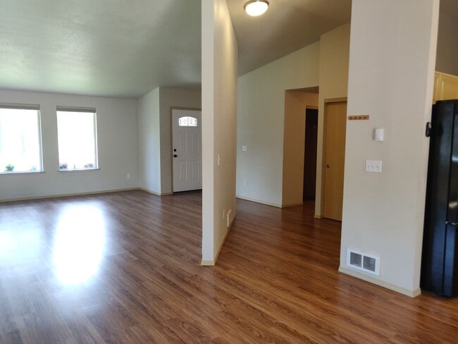 Building Photo - Charming 4-Bedroom Home on 1/2 Acre with a Fenced Backyard, Fully Insulated Double-Car Garage, in...