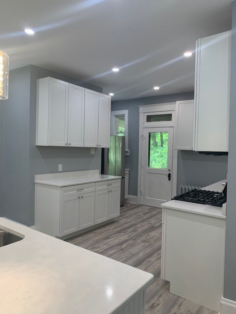 Back door access to kitchen and home. - 1660 Bruce Ave