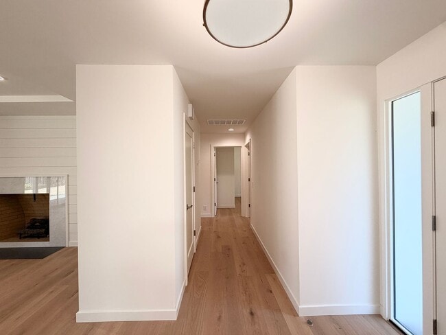 Building Photo - This premier 4-bed, 3-bath estate spans 2,565 sq. ft. on a 10,253 sq. ft. lot in North Los Altos.
