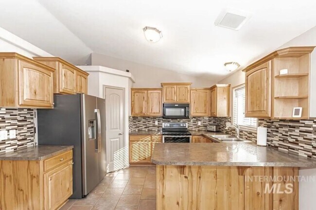 Foto del edificio - Spacious 5BR House in Ammon