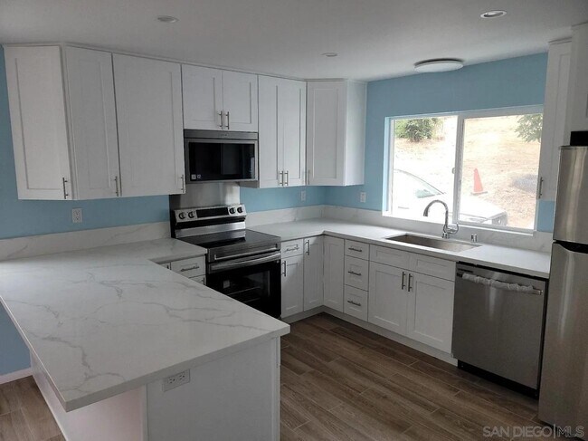 Building Photo - 9612 Petite Ln