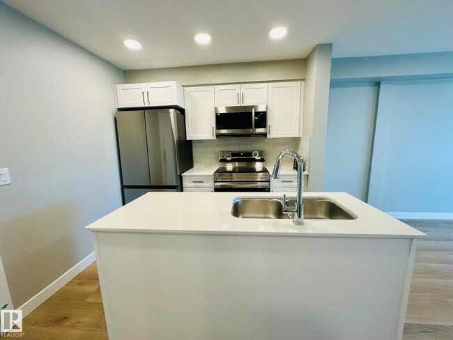 Building Photo - #320 1506 TAMARACK BV NW
