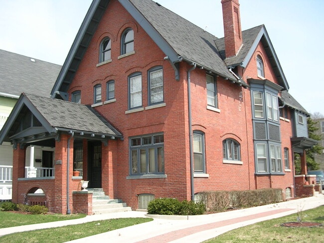 Beautiful brick building with front porch - 2582 N Cramer St