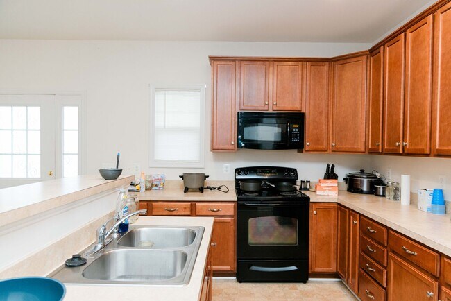 Building Photo - Comfort, Convenience, and Community Living...