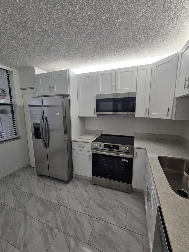 Building Photo - 1228 S Military Trail