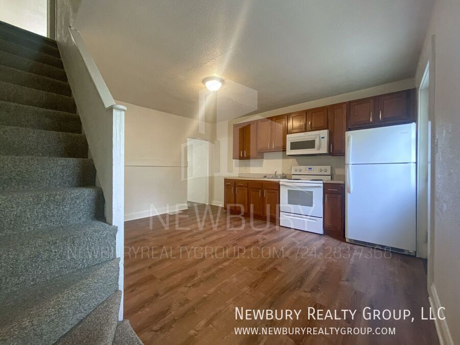 Foto principal - Charming Two-Bedroom Townhouse-Style Apart...