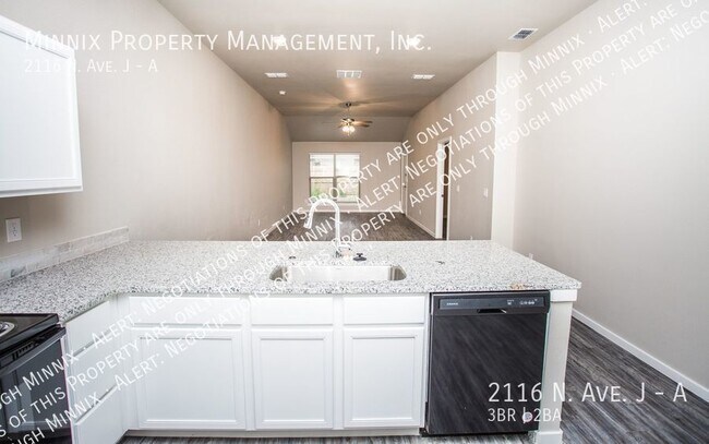 Building Photo - 2116 N. Ave J #A