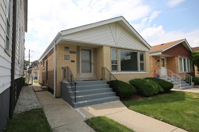 Building Photo - 5418 S Lorel Ave