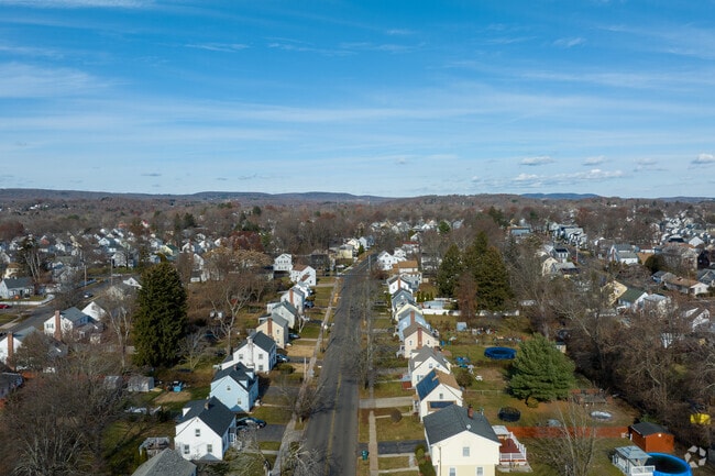 Rows of homes in Hamden typically sit on lots of well manicured lawns.