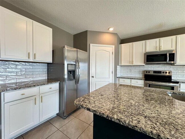 Foto del edificio - 5642 Westerly Breeze Pl