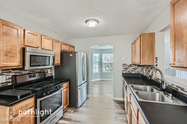 Building Photo - 4 br, 2 bath House - 905 Reda Court UNIT