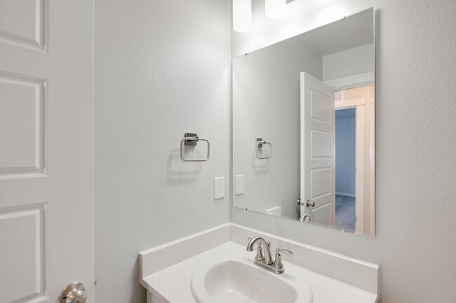 Building Photo - This gorgeous 3 bedroom, 2.5 bath townhome is 1440 square feet of HOME!