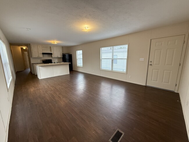 Living Room into Kitchen - 837 Sunflower Ln