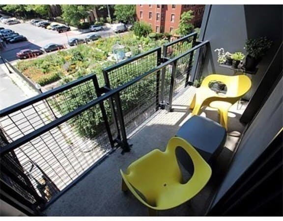 Private deck overlooking community garden - 691 Massachusetts Ave Apartment
