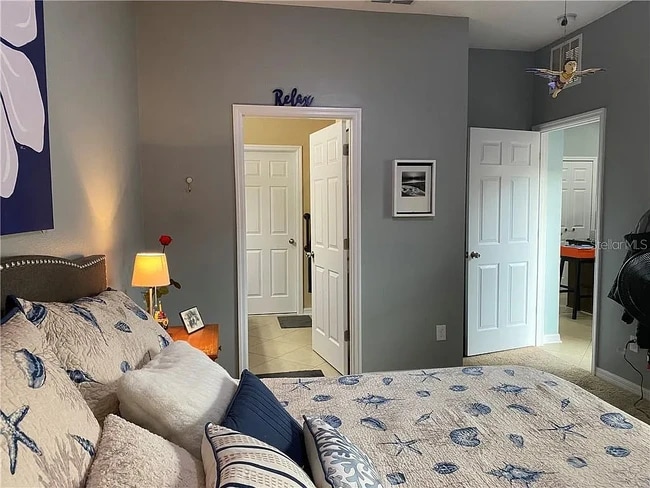 master bedroom on first level - 504 Rainbow Springs Loop