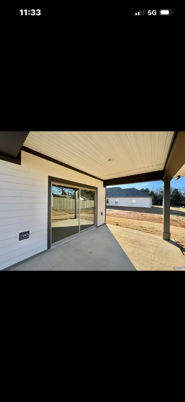 Foto del edificio - "NEWLY BUILT- Spacious 4-Bedroom Haven with Granite Elegance and Cozy Fireplace in Harvest"