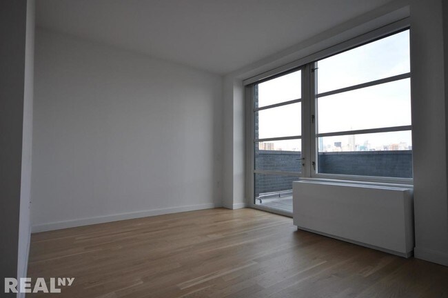 Foto del edificio - 331 E Houston St