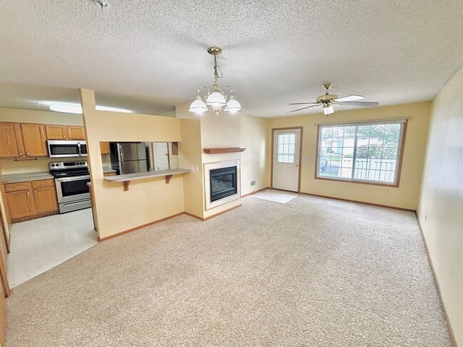 Building Photo - 2 Bedroom Townhome Nestled in The Heart of...