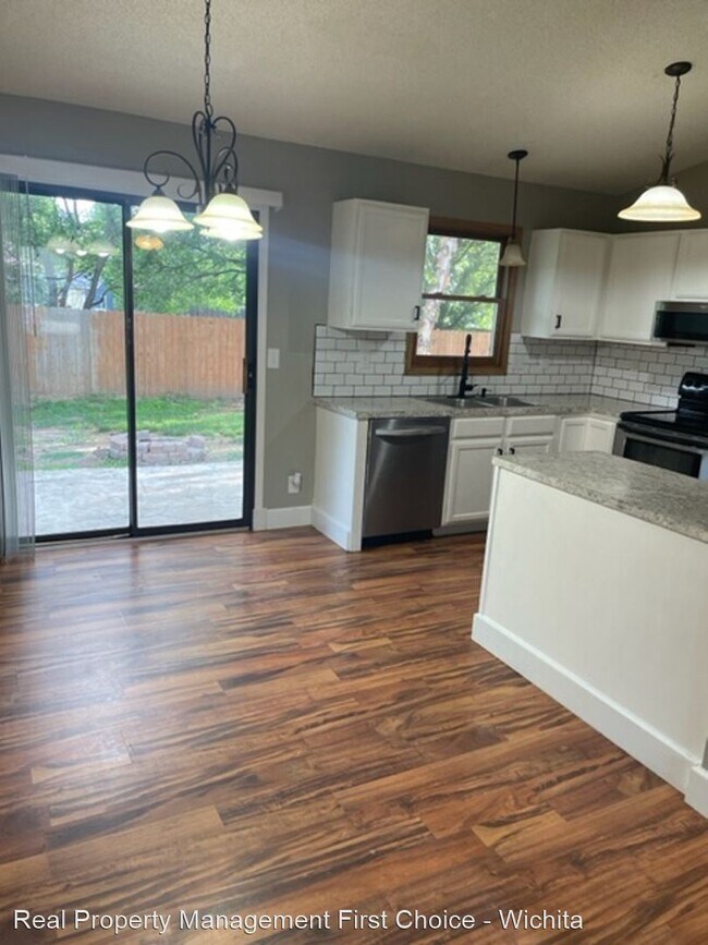 Building Photo - 4 br, 3 bath House - 10802 W. Stafford St.