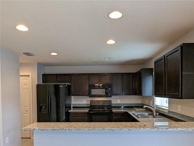 Building Photo - 219 Woodknoll Pl