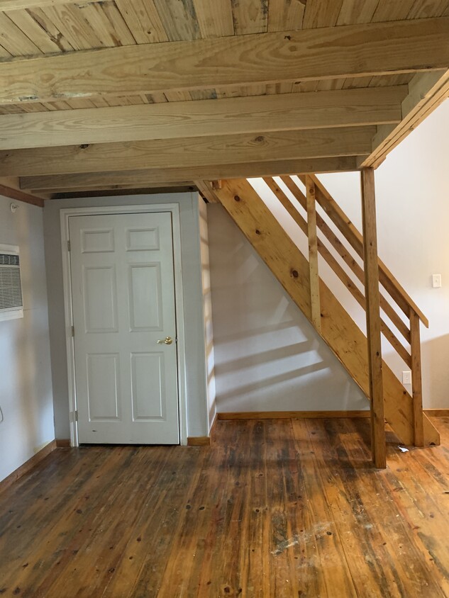 Closet in living room with stair to loft - 1112 Cardinal St #106