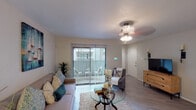 Located at 10010 Kempwood Dr in Houston, Texas, this single-floor residence offers a thoughtfully designed layout that balances comfort and functionality. The living room serves as the heart of the home, featuring wood-look flooring, a decorative ceiling light fixture, and large sliding glass doors fitted with vertical blinds that open to a private outdoor patio, flooding the space with natural light. The open and inviting atmosphere is well-suited for both relaxing and entertaining.

The dining area is a defined, intimate nook highlighted by a stylish pendant light overhead and enough space for a round table and chairs — ideal for casual meals or gatherings.

The galley-style kitchen is efficiently organized with white cabinetry, mosaic tile backsplash, granite-look countertops, and black appliances including a refrigerator and electric range, providing a clean and practical cooking space.

Two bedrooms offer comfortable retreats, each with wood-look flooring, ceiling fan light fixtures, and windows dressed with blinds that allow for natural light and privacy. The bedrooms are well-proportioned and connect easily to the rest of the home.

The bathroom is bright and cleanly finished in white, featuring a tub-shower combination with floor-to-ceiling tile surround, a toilet, and a vanity — a simple, crisp space with a spa-like feel.
