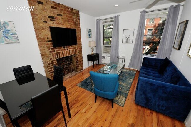 Building Photo - 408 W 49th St
