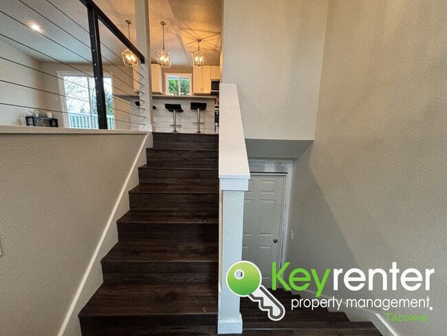 Building Photo - Split level 3 Bed 2 Bath Upstairs Unit with Modern Upgrades Close to JBLM!