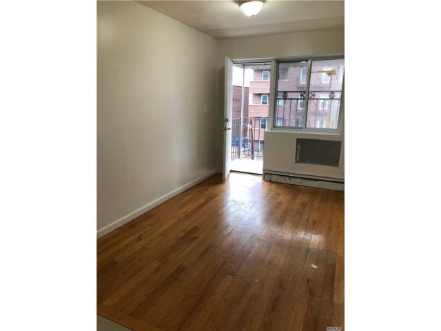 Building Photo - 77-16 Woodside Ave