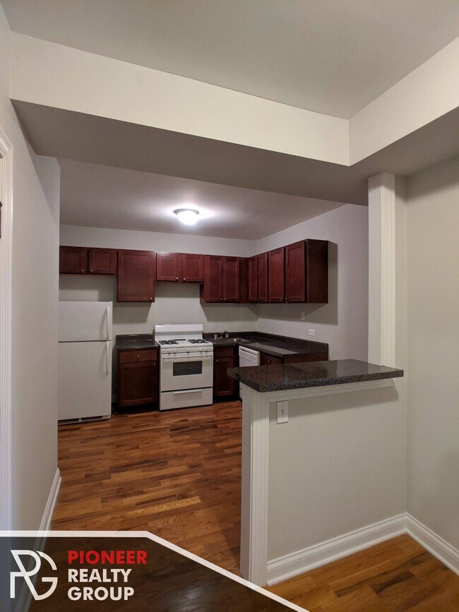 Foto del edificio - 1446 W Byron St