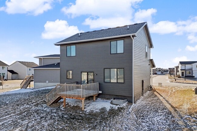 Building Photo - Spacious 4-Bedroom Home with 2-Car Garage & Yard