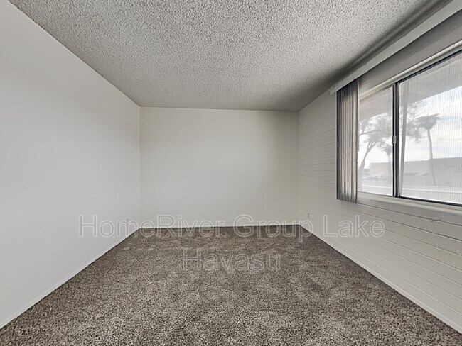 Building Photo - 2020 Smoketree Ave N