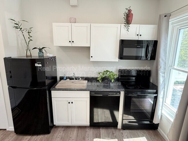 Foto del edificio - 104 E Main St