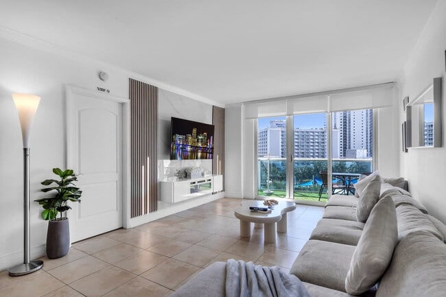 Building Photo - 19370 Collins Ave