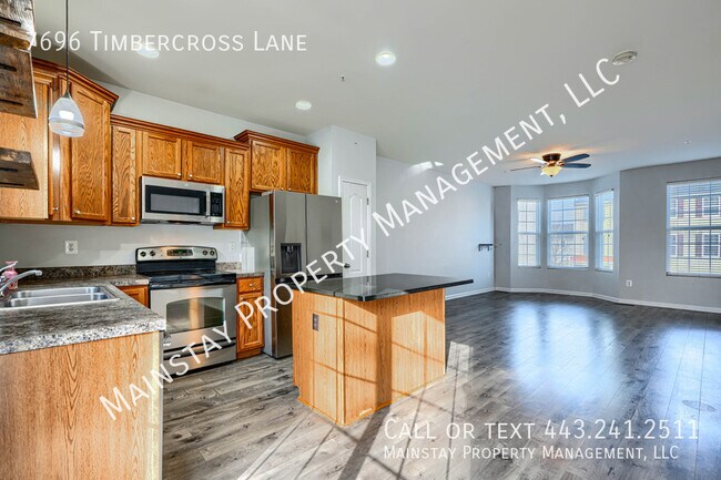 Foto del edificio - 7696 Timbercross Ln