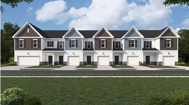 Building Photo - SPECIAL PRICING NOW! NEW TOWNHOMES ACROSS ...