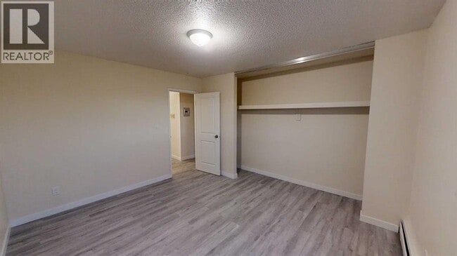 Building Photo - 9515-9100 100 Ave.