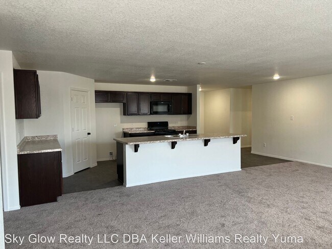 Building Photo - 5 br, 3 bath House - 7682 E. 43rd Pl.