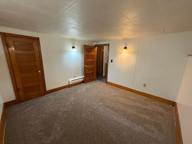 Building Photo - Two bedroom, One and half bathroom house, with additional living room, and bonus room!