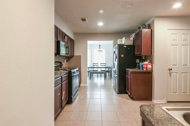 Foto del edificio - 4854 Fair Oak Dale Ln