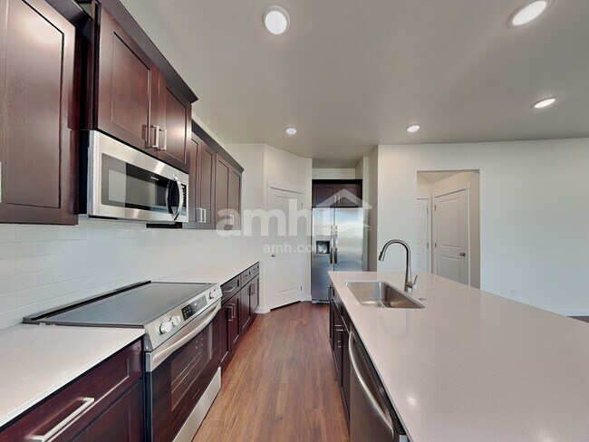 Building Photo - 9486 W Bowie Ct