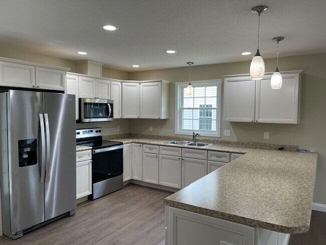 Building Photo - BRAND NEW Three Bedroom House