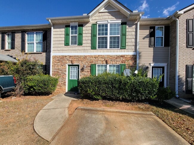 Building Photo - Experience modern living in this stunning two-story townhome! Awesome School District