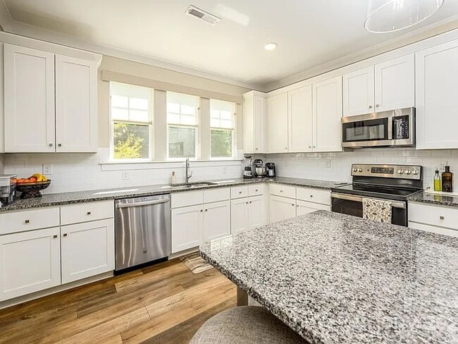 Building Photo - Completely NEW! 3BR w/ 2-Car Garage + Balcony