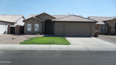 Building Photo - 8441 W Dahlia Dr