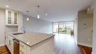Step into a world of contemporary elegance and effortless living in this meticulously designed 680 square foot condo. The moment you enter, you'll be captivated by the seamless blend of style and functionality that defines every inch of this urban oasis.

The heart of this home is the stunning open-concept kitchen and living area. Gleaming hardwood floors extend throughout, creating a warm and inviting atmosphere. The gourmet kitchen is a chef's dream, boasting sleek white cabinetry, high-end stainless steel appliances, and elegant granite countertops. Whether you're preparing a quick breakfast or hosting a dinner party, this space is designed to inspire culinary creativity.

The generously sized 130 square foot bedroom is your personal retreat, offering ample space for relaxation and rejuvenation. Large windows invite natural light to dance across the room, while providing picturesque views of the surrounding cityscape. Imagine waking up to the soft glow of sunrise, ready to embrace each new day.

Two luxurious bathrooms elevate your daily routine to a spa-like experience. Marble-inspired tile floors, sleek vanities, and modern fixtures create an ambiance of indulgence and tranquility. The attention to detail in these spaces truly sets this home apart.

Throughout the condo, you'll find thoughtful touches that enhance your lifestyle. Ample storage solutions, including a dedicated closet, ensure that every belonging has its place. The open layout creates a sense of spaciousness, perfect for both quiet nights in and entertaining friends.

This condo isn't just a place to live; it's a statement of your success and a canvas for your aspirations. Located at 400 Prospect St Unit 303, you're at the heart of urban convenience while enjoying the serenity of a private retreat. Experience the pinnacle of city living – where luxury, comfort, and style converge to create your perfect home.