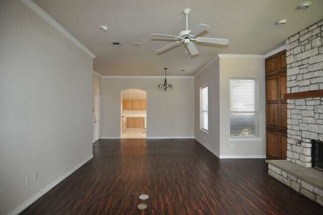 Building Photo - Welcome to this charming 3-2-2 brick home ...