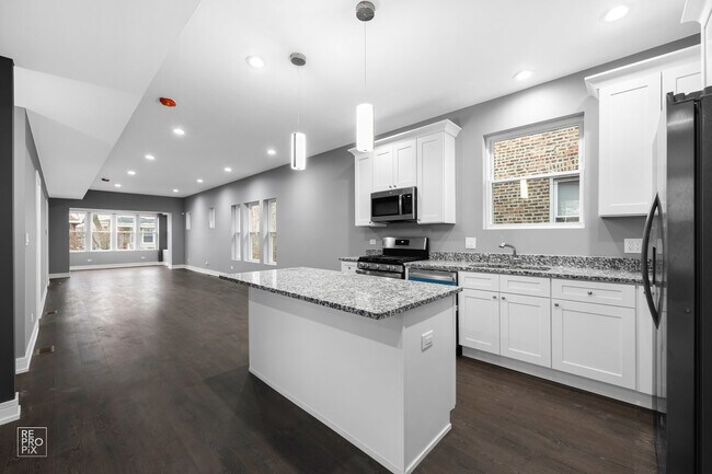 Building Photo - 7734 S Langley Ave